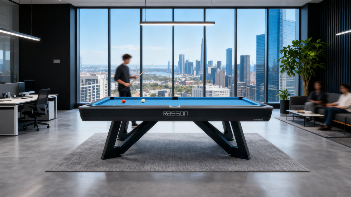 Rasson Wolf table in an office lounge setting, city skyline behind