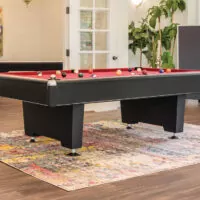 black pool table with red felt