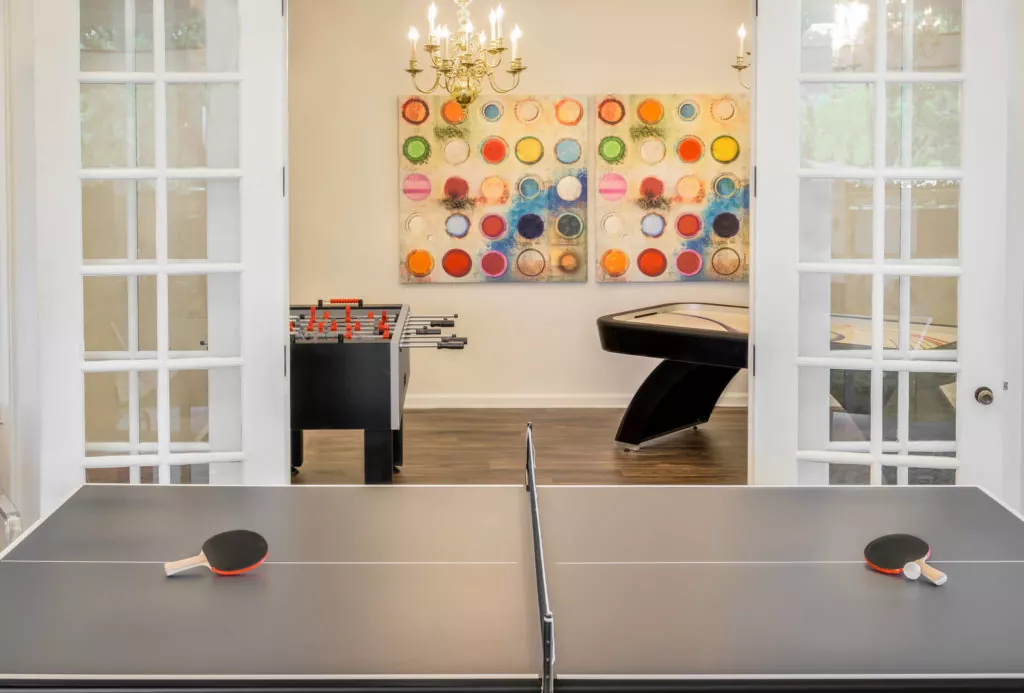 Game table room setting games Room Setting with ping pong table, foosball table and air hockey table