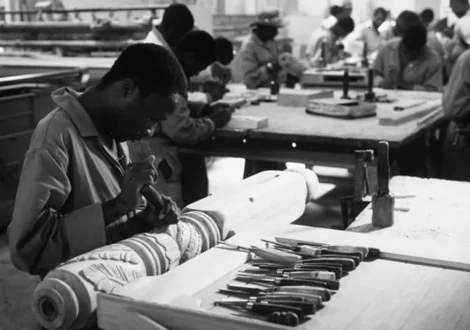 Men working in a wood work shop