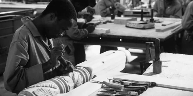 Men working in a wood work shop